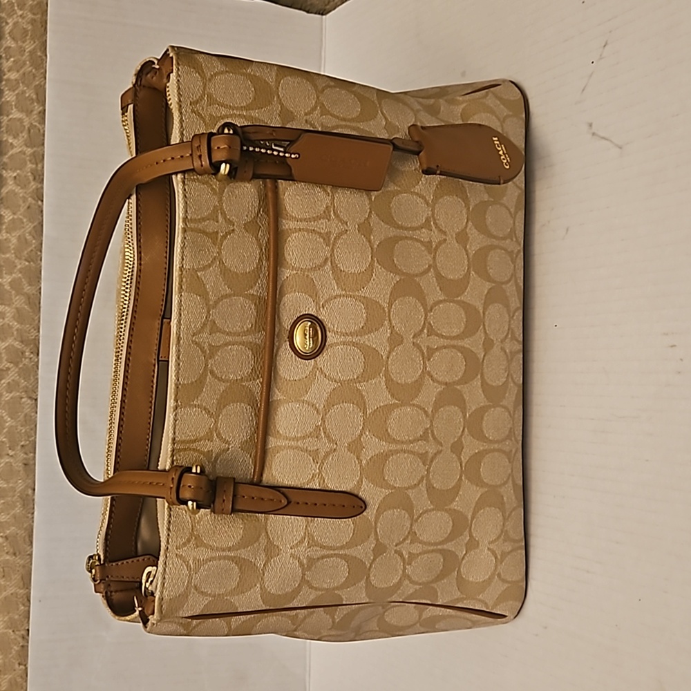 Coach large multicompartment satchel.